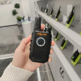 Chierda CD-X9 programming software on a handheld two-way radio held in a hand, ideal for communication