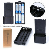 Baofeng UV5R extended battery case showing battery slots and clips for radio communication batteries