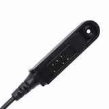Close-up of black connector plug for Baofeng UV9r earpiece headset with six gold contact pins