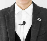 BOYA BY-DM1 Lightning mic clipped on white shirt worn with dark blazer for clear audio recording