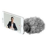 BOYA BY-DM200 microphone for iPhone attached to a smartphone recording a speaker in a video setup