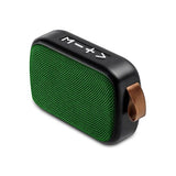 Cloth covered Bluetooth speaker in green with a sleek design and convenient handle for portable music enjoyment