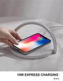 LED desk lamp with wireless charger featuring a sleek design and 10W express charging pad for convenience