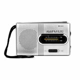 Indin portable AM FM pocket radio in silver with compact design and hand strap for easy carrying