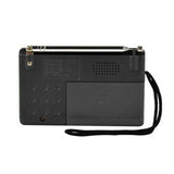 Indin portable AM FM radio with a sleek design and an attached wrist strap for easy carrying