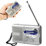 Indin Portable AM FM radio in silver with extendable antenna and compact design for easy portability