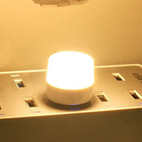 USB LED mini night light glowing softly on a power hub, perfect for gentle illumination