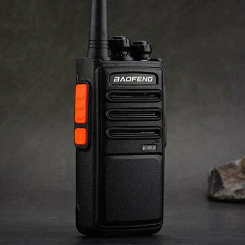 Professional 2-way radios including Baofeng handheld model with antenna and orange side buttons