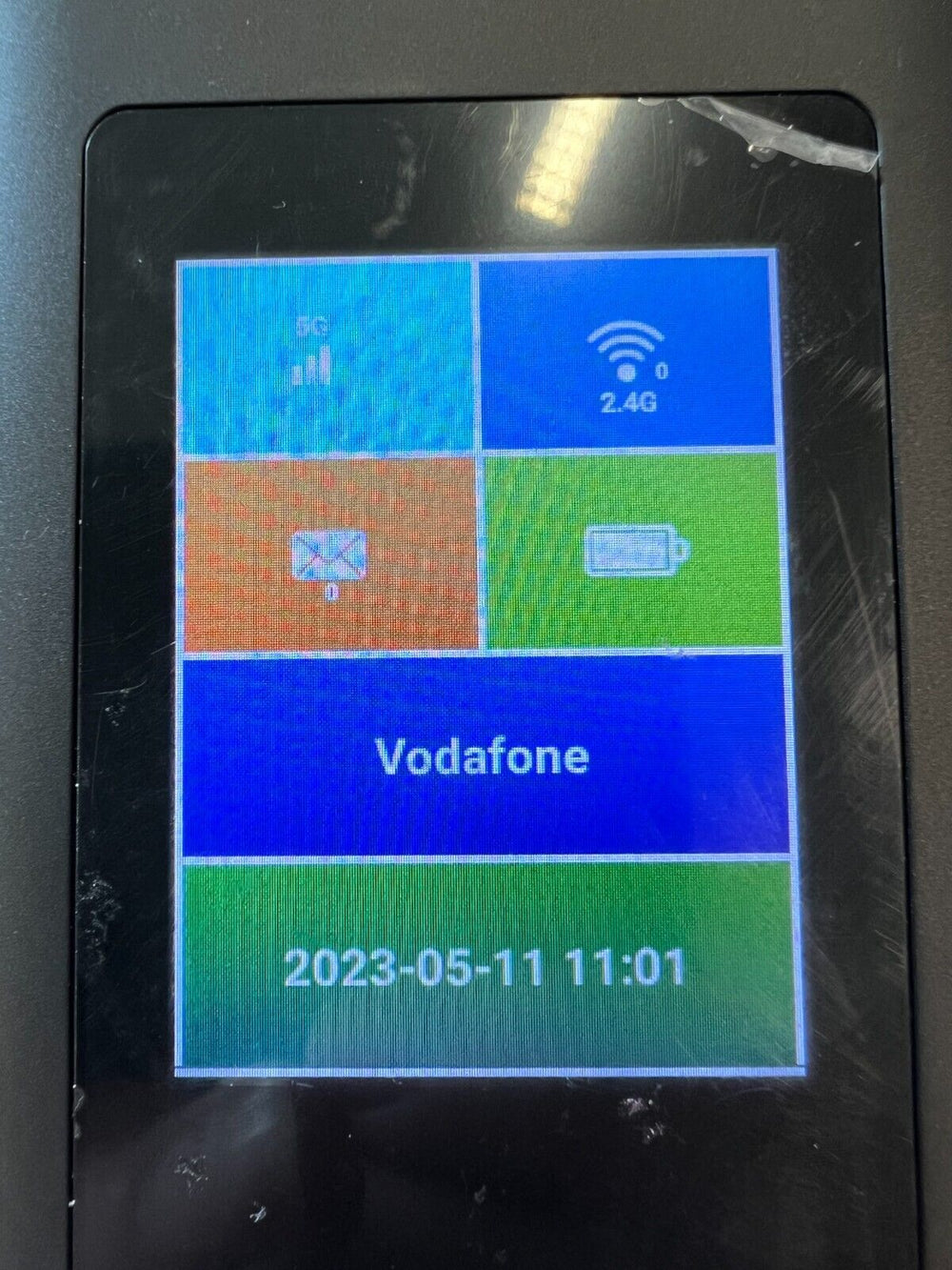 5G mobile Wi-Fi device UK displaying connection status and battery life on touchscreen