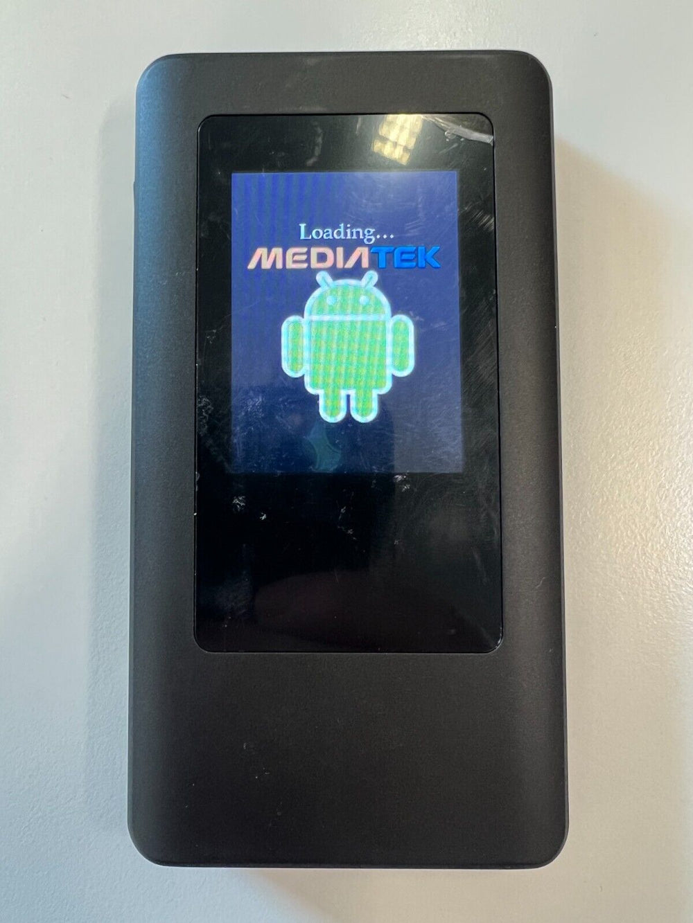 Unbranded 5G mobile Wi-Fi device UK displaying MediaTek logo on a sleek black exterior
