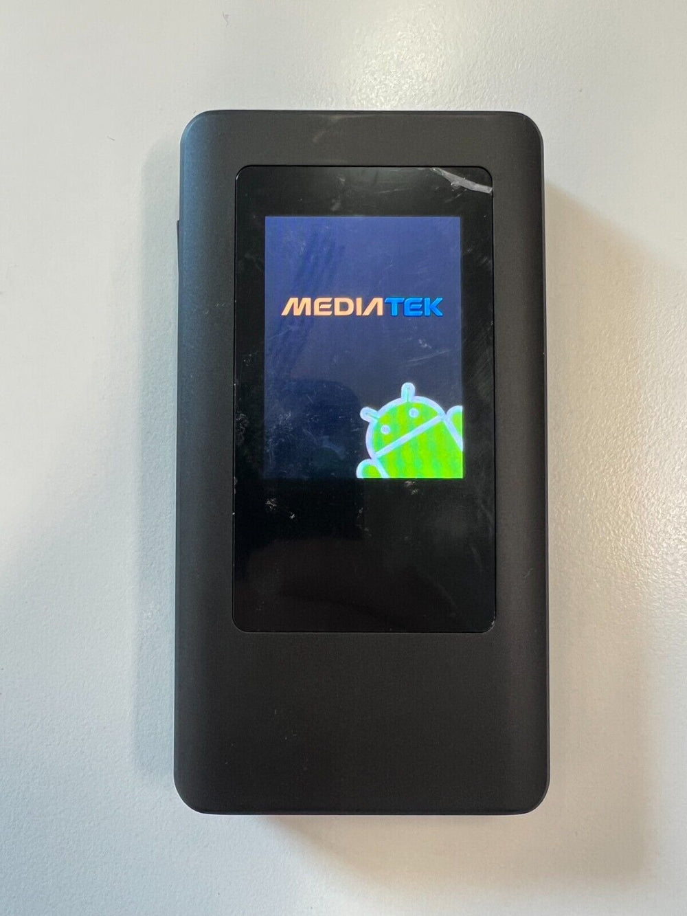 Unbranded 5G mobile Wi-Fi device UK with Mediatek logo and user-friendly touchscreen display