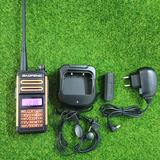Baofeng TR-988UV triband radio with charger, earpiece, and power adapter for reliable communication