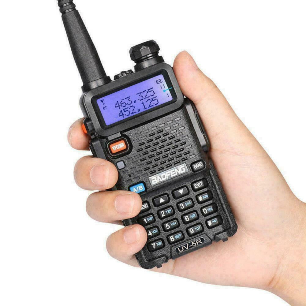 Baofeng UV-5R dual band radio held in hand with clear LCD display and keypad for easy communication