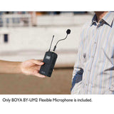 Hand holding BOYA BY-UM2 mini microphone with flexible design for clear audio capture