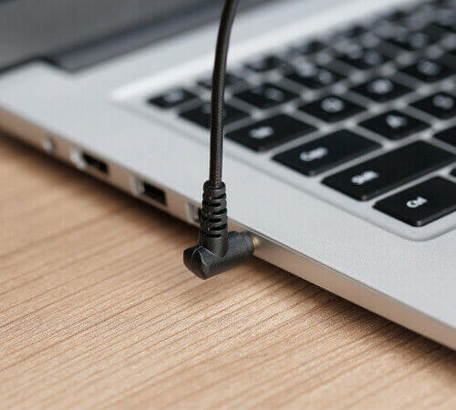 BOYA BY-UM4 flexible microphone connected to a laptop for clear audio recording