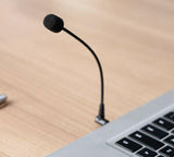 BOYA BY-UM4 flexible microphone positioned near a laptop for clear audio capture
