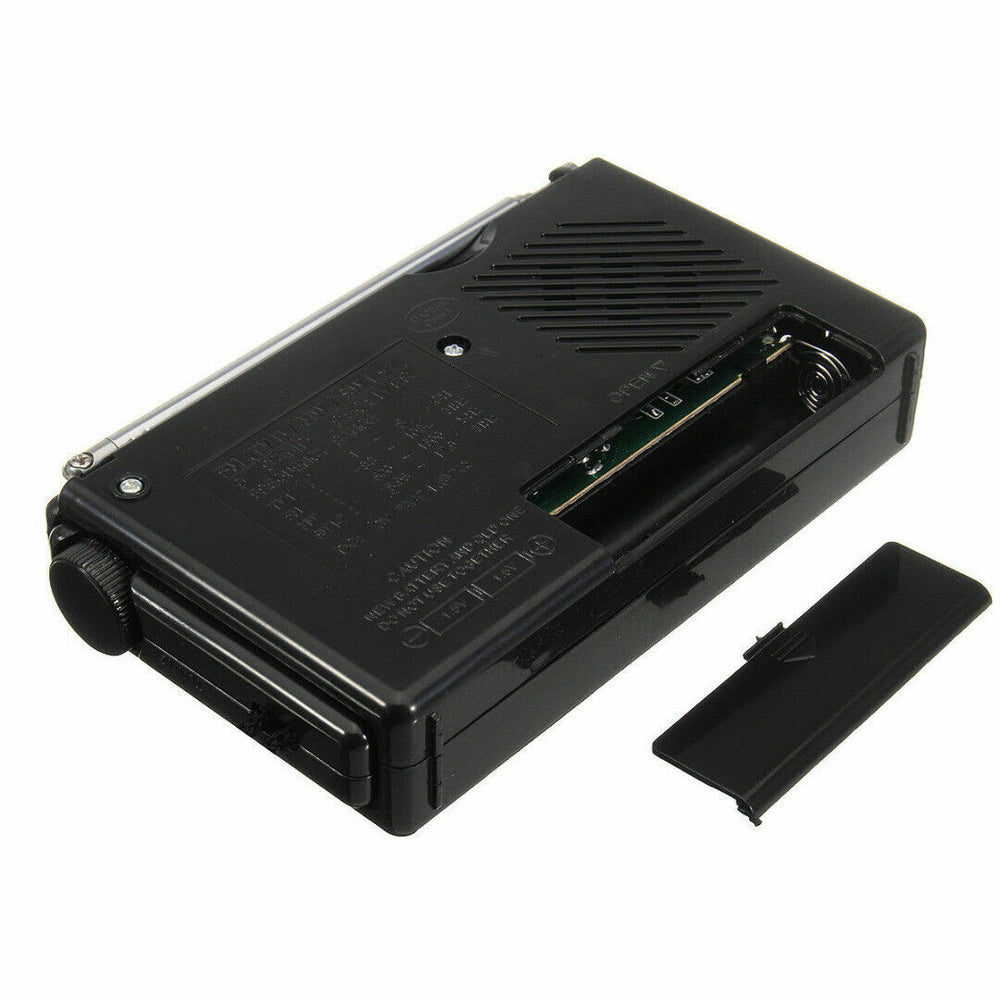 Compact portable AM FM SW radio receiver with battery compartment and tuning dial for easy use