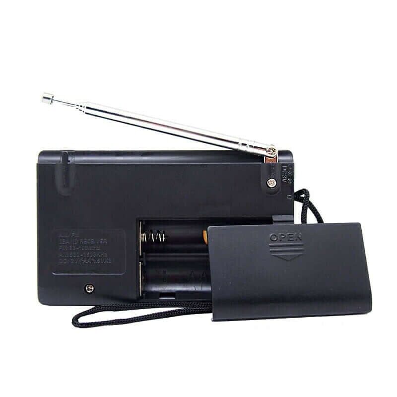 DEKKO portable AM FM radio with extendable antenna and battery compartment for on-the-go listening