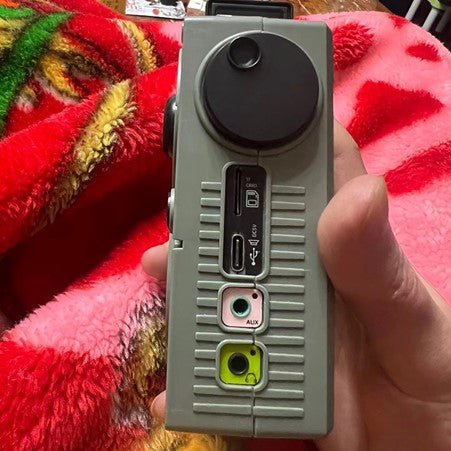 HanRongDa mini receiver radio with Bluetooth featuring USB and AUX connections on the side