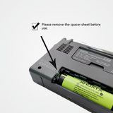 XHDATA D-808 digital radio showing battery compartment and removal instructions for spacer sheet