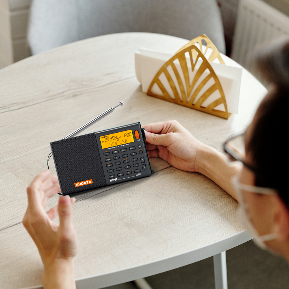 XHDATA D-808 digital radio with a clear display and tuning buttons, ideal for portable music and news